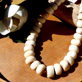 African white bead strands. Made out of bone.