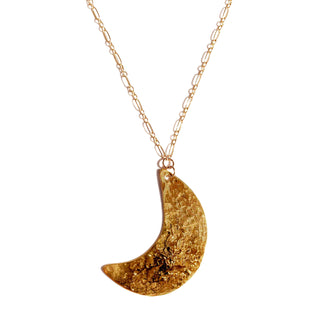Hammered Crescent Moon Necklace on 14karat gold fill chain. On a white background. The necklace is shiny gold.