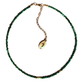 Petite malachite faceted stone strung together with tiny gold spacers beads mixed amongst them.