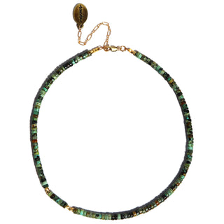 green turquoise stone beads with a few gold beaded accents. 14k Gold Fill chain is adorned with a draping “Often Wander” charm down the back.
