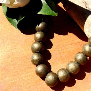 African shiny brass bead strands.