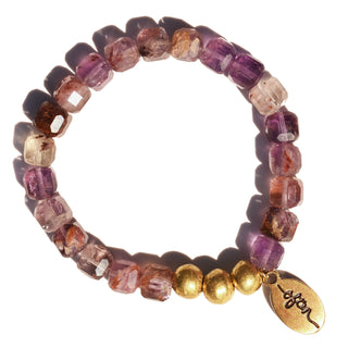 Super 7 Cube Shaped Beads on a bracelet with a fusion of seven different crystals, along with an accent of 3 brass beads & a brass Often Wander Charm