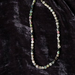 Cubed Rainbow Tourmaline beads in Dark Green, Green, Clear, Purple beads with gold spacers between each bead.