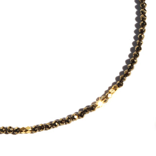 pyrite petite faceted beads with a few gold accent beads