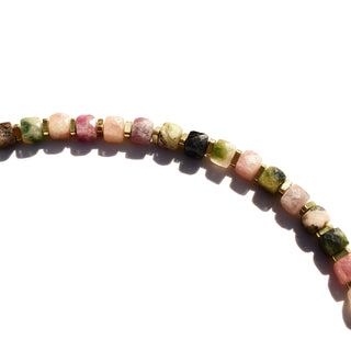 Cubed Rainbow Tourmaline beads in Dark Green, Green, Clear, Purple beads with gold spacers between each bead.