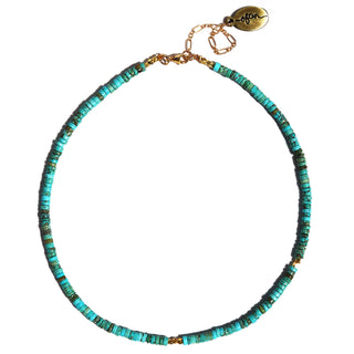 Blue Turquoise beads with a few gold accent beads on a choker necklace.