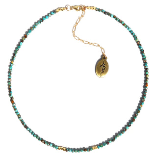 blue turquoise small faceted beads with a few gold accent beads