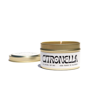 A 6 oz gold tin vessel with matching gold lid. White & Black candle label that says "Citronella". Scent is Citronella. Made with soy wax.