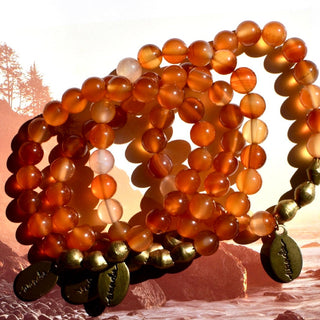 Carnelian Beaded Bracelets. Rich golden ambers and orange glassy tones, all stacked together.