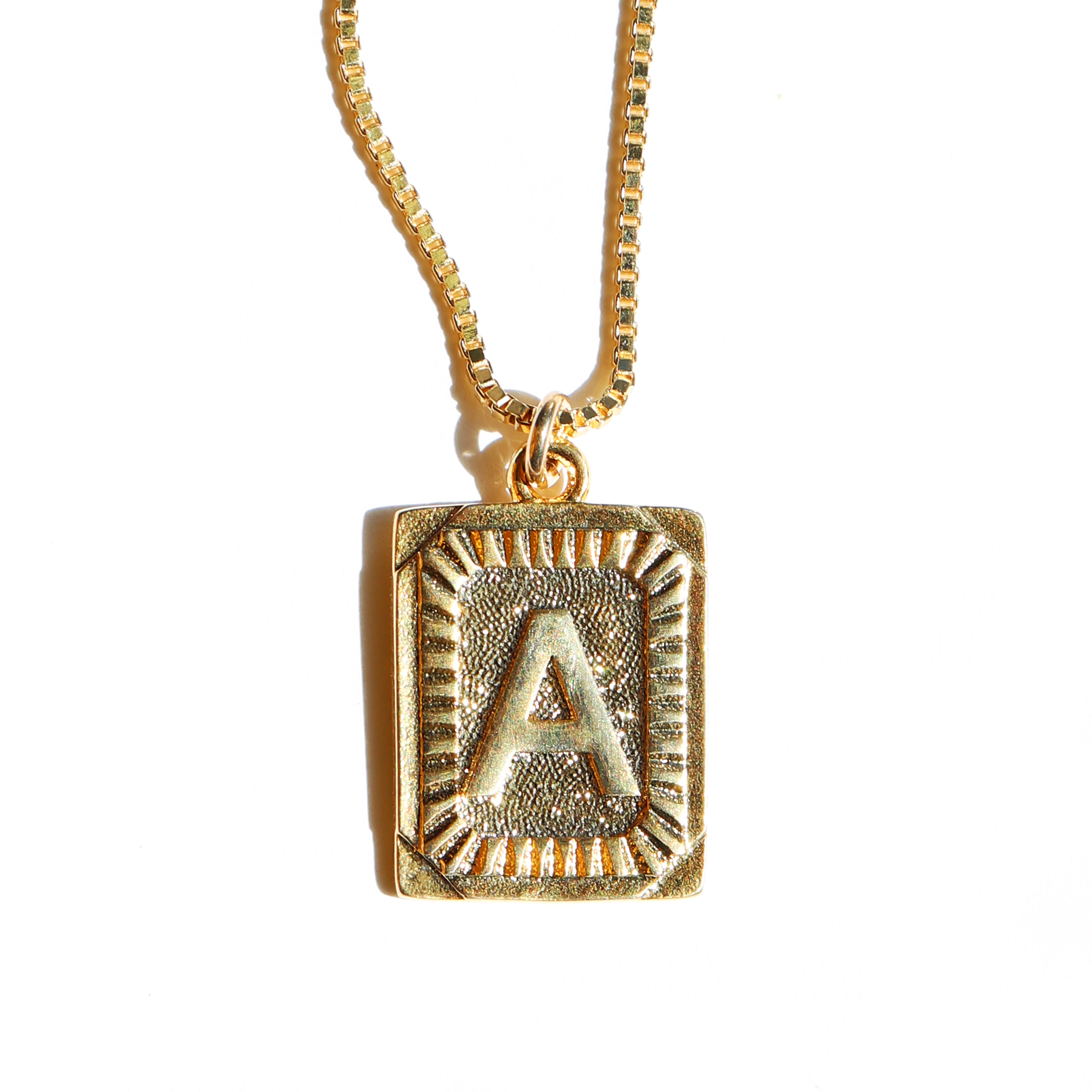 letter a gold pendant