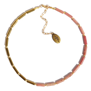 asymmetric tube bead necklace. Rhodonite beads on one side and gold beads on the other side. Along with small gold accent beads between each tube bead.
